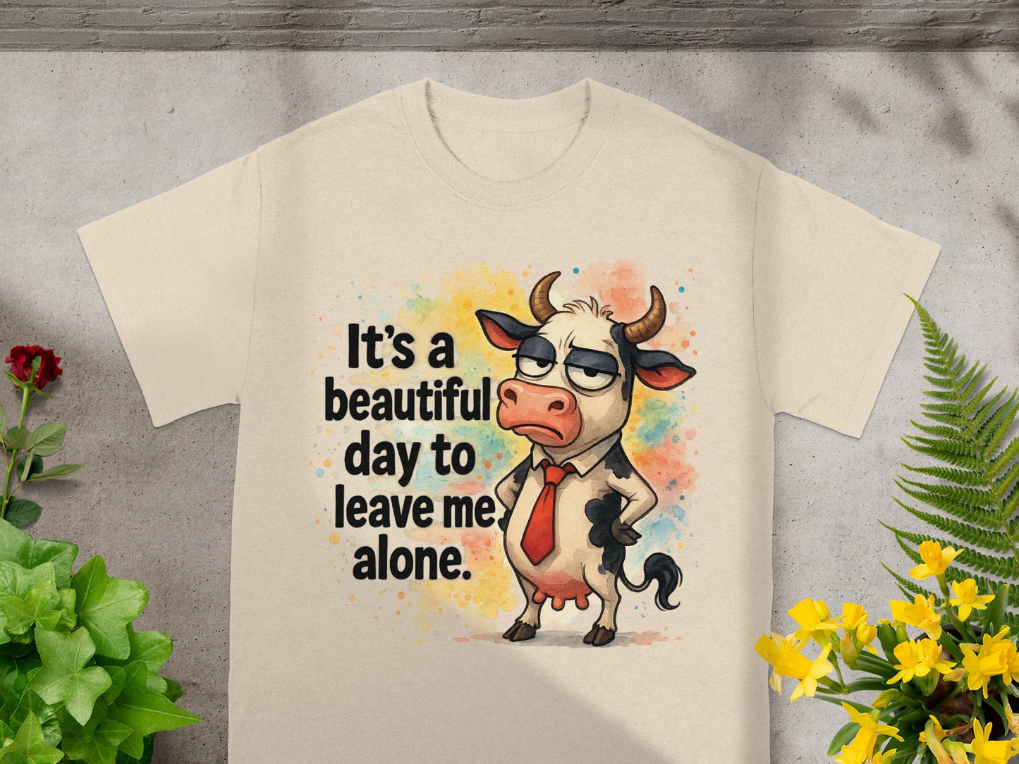 Cream t-shirt with cartoon cow saying "It's a beautiful day to leave me alone."