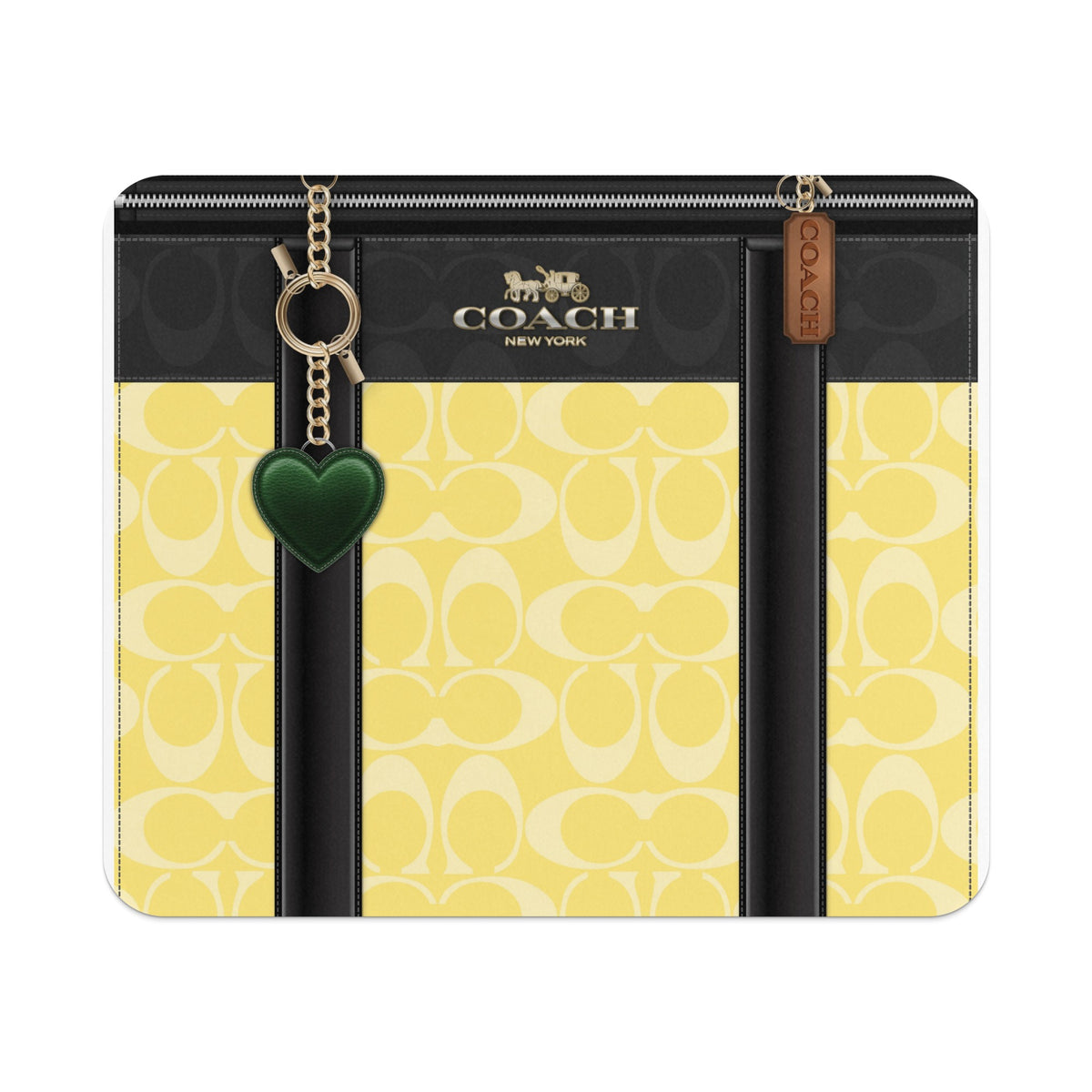 Coach patterned case with leather trim, zipper, and green heart charm.