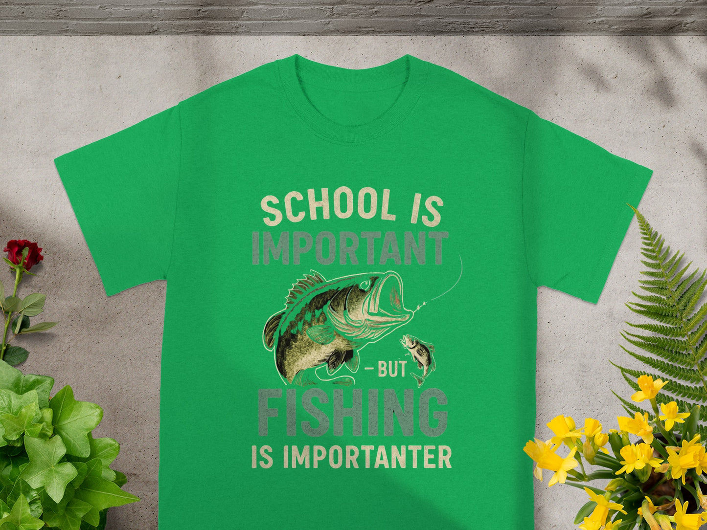Green t-shirt with "School is Important - But Fishing is Importanter" text and fishing graphic.