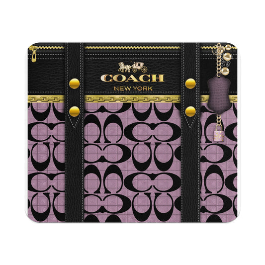 Coach New York pattern with black leather straps and gold accents.
