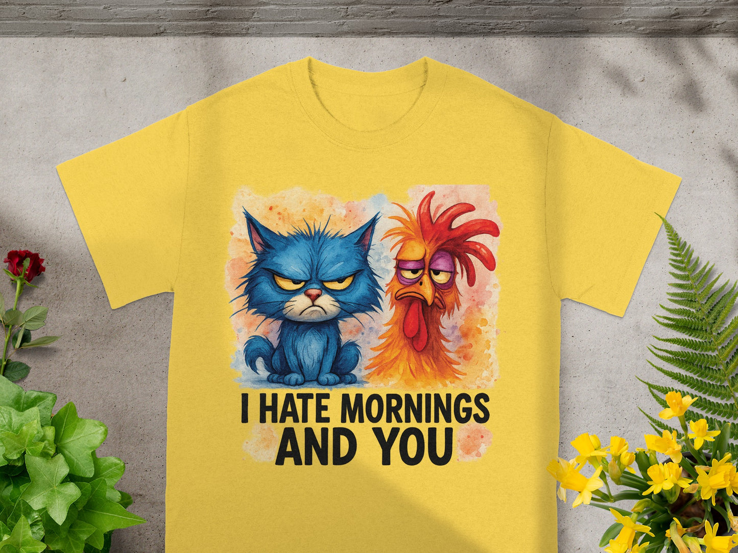 Blue grumpy cat and red rooster on yellow t-shirt with text "I Hate Mornings And You".