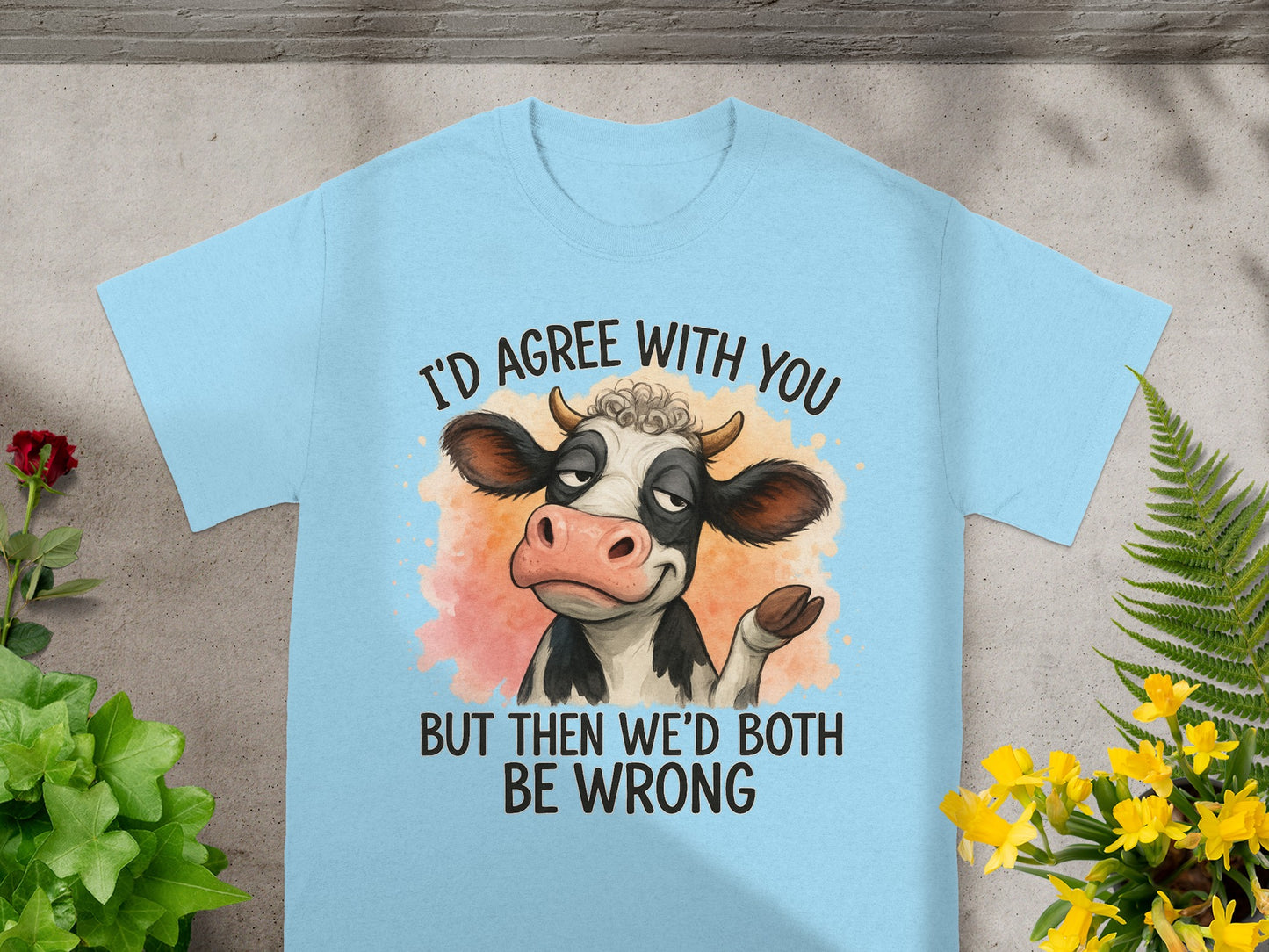 Light blue t-shirt with a cartoon cow saying "I'd agree with you but then we'd both be wrong."