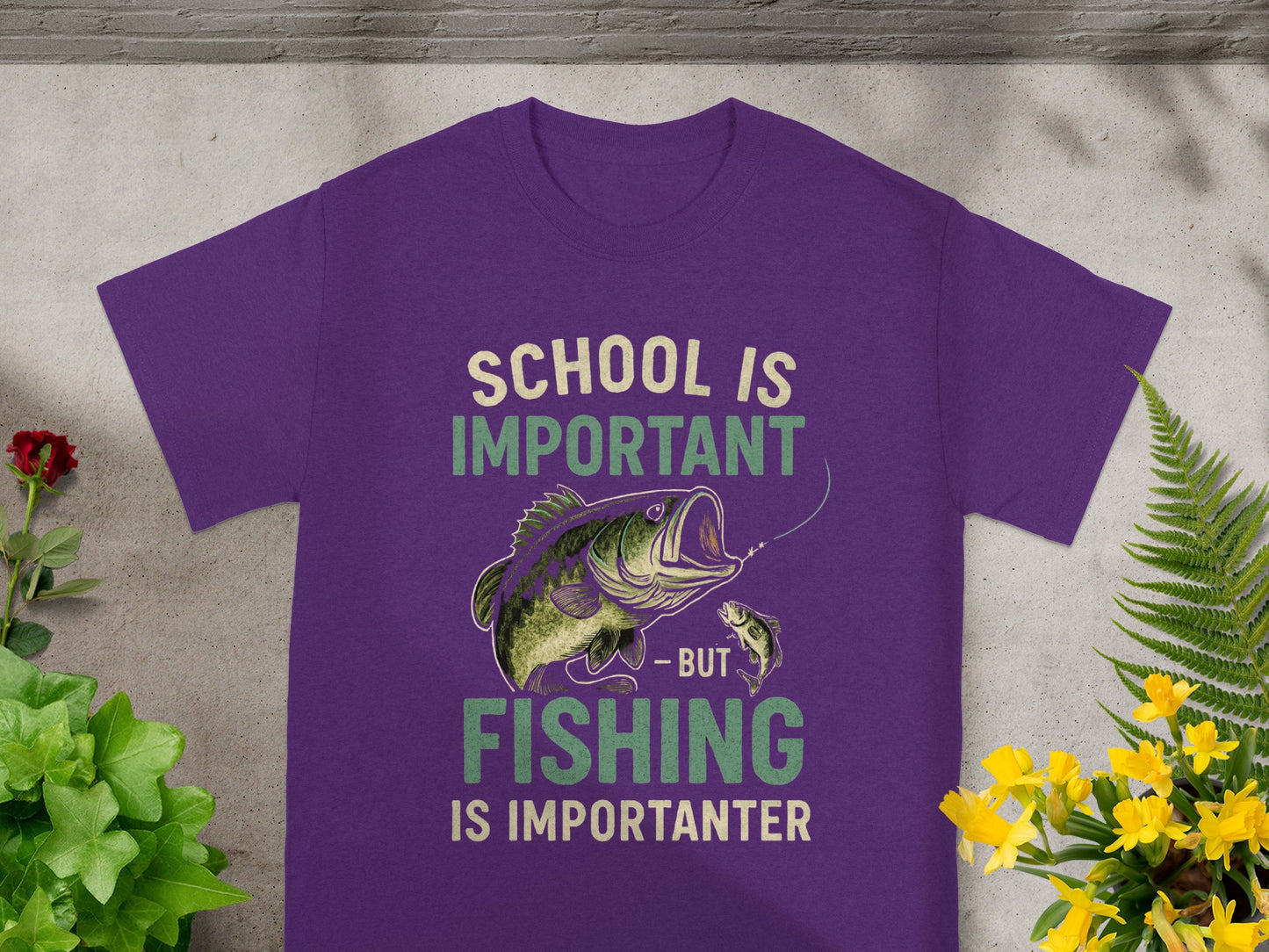 Purple t-shirt with text "School is Important - but Fishing is Importanter" and fish graphic.