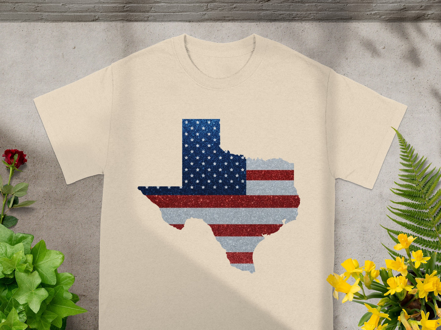 T-shirt with Texas outline filled with American flag glitter design.