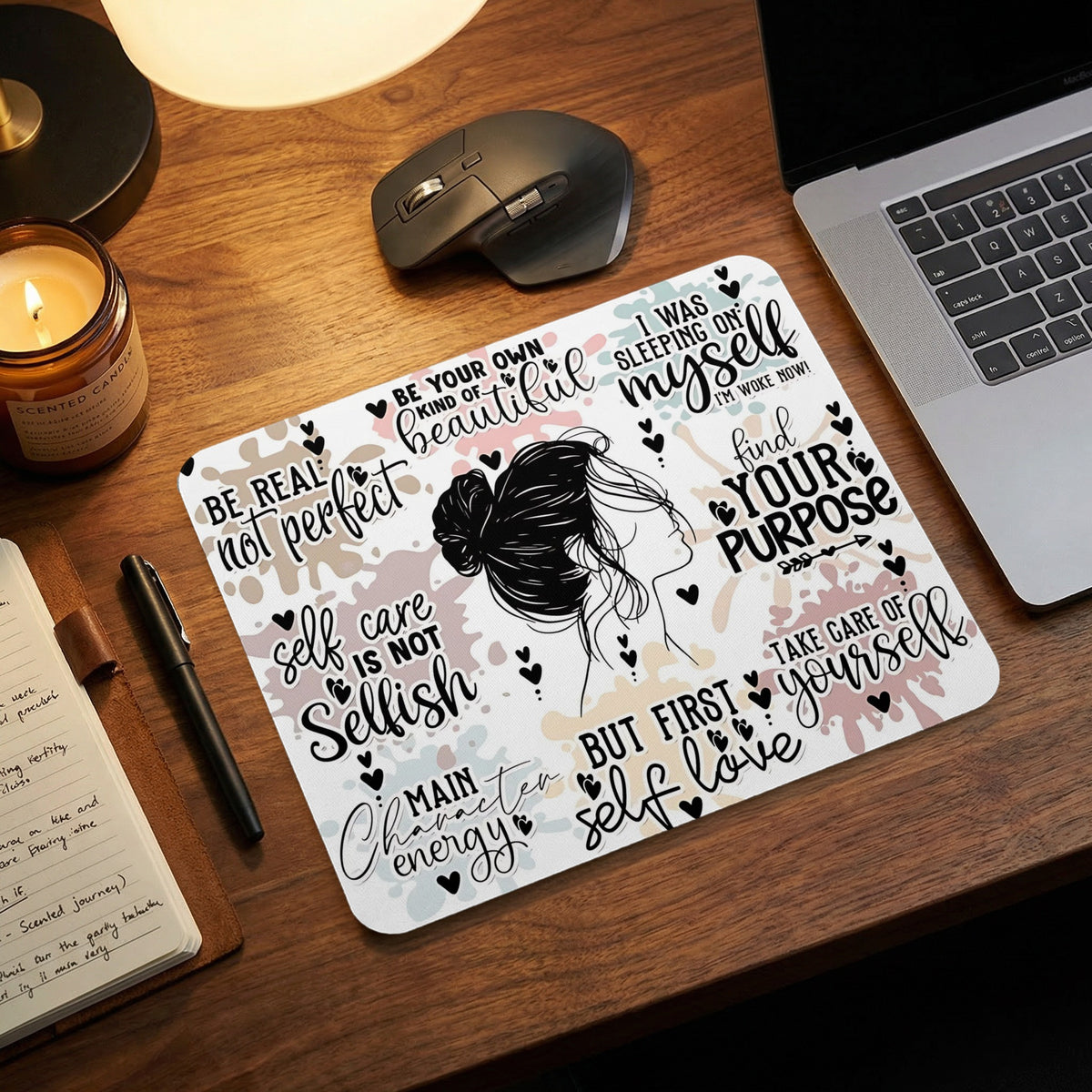 Mousepad with inspirational text and silhouette of a woman's profile.
