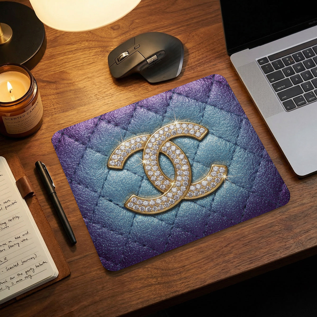 Diamond CC logo on quilted purple and blue mousepad.