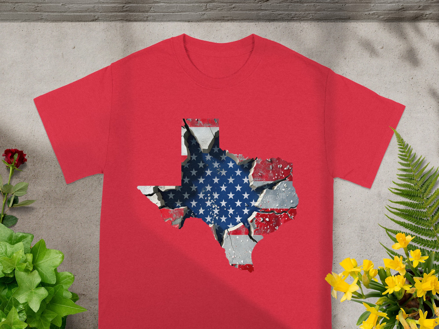 Red t-shirt with a cracked Texas map filled with an American flag design.