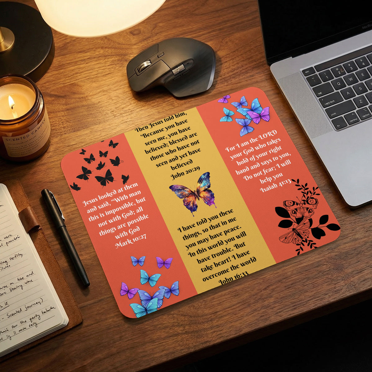 Three-panel desk mat featuring Bible verses, butterflies, and colorful backgrounds on a wooden desk.