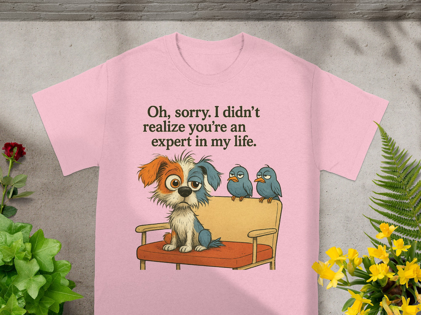 Pink t-shirt with cartoon dog and birds, text reads "Oh, sorry. I didn't realize you're an expert in my life."