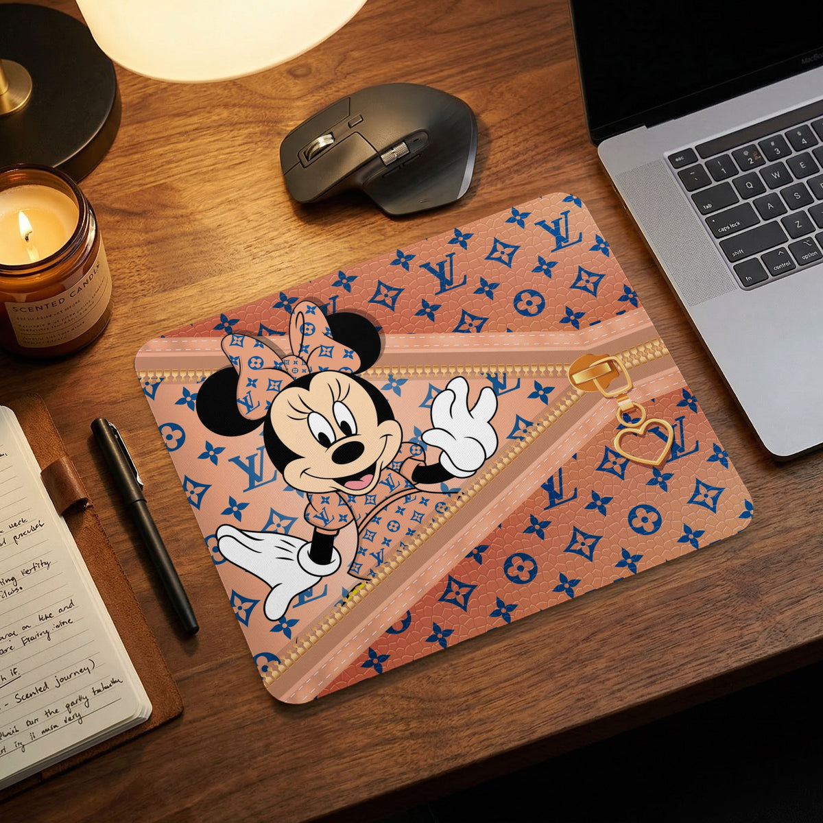 Mousepad featuring Minnie Mouse and a monogram pattern with gold zipper detail.