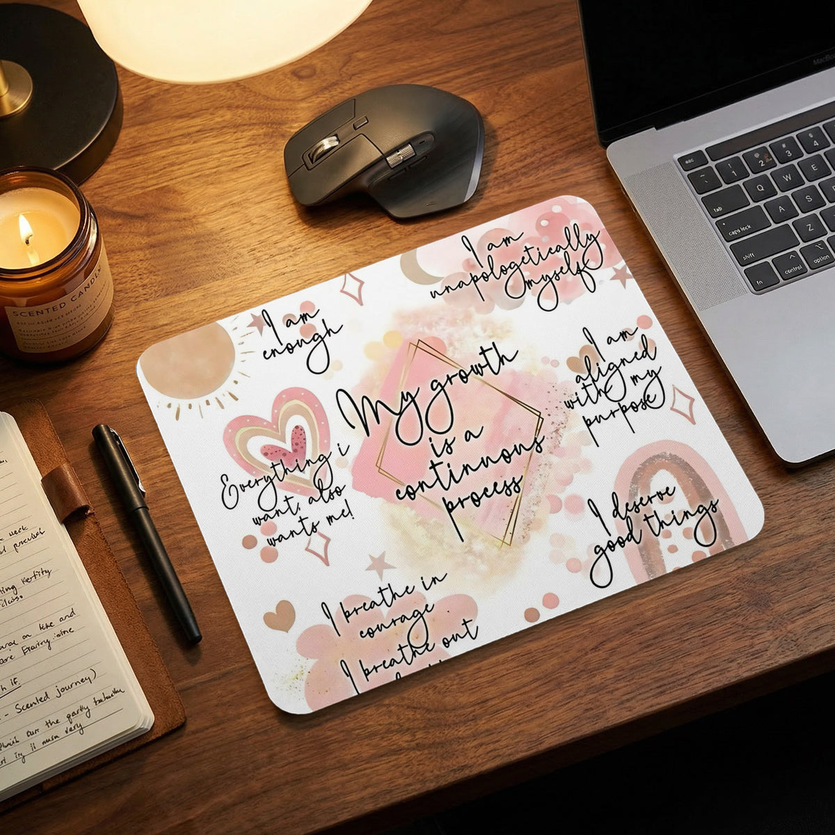Mousepad with affirmations and abstract watercolor art in pink and gold.