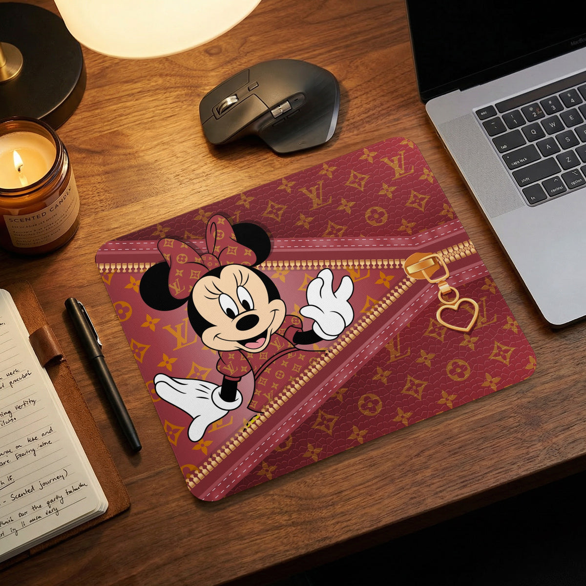 Minnie Mouse mousepad with a designer pattern, zipper, and heart charm.