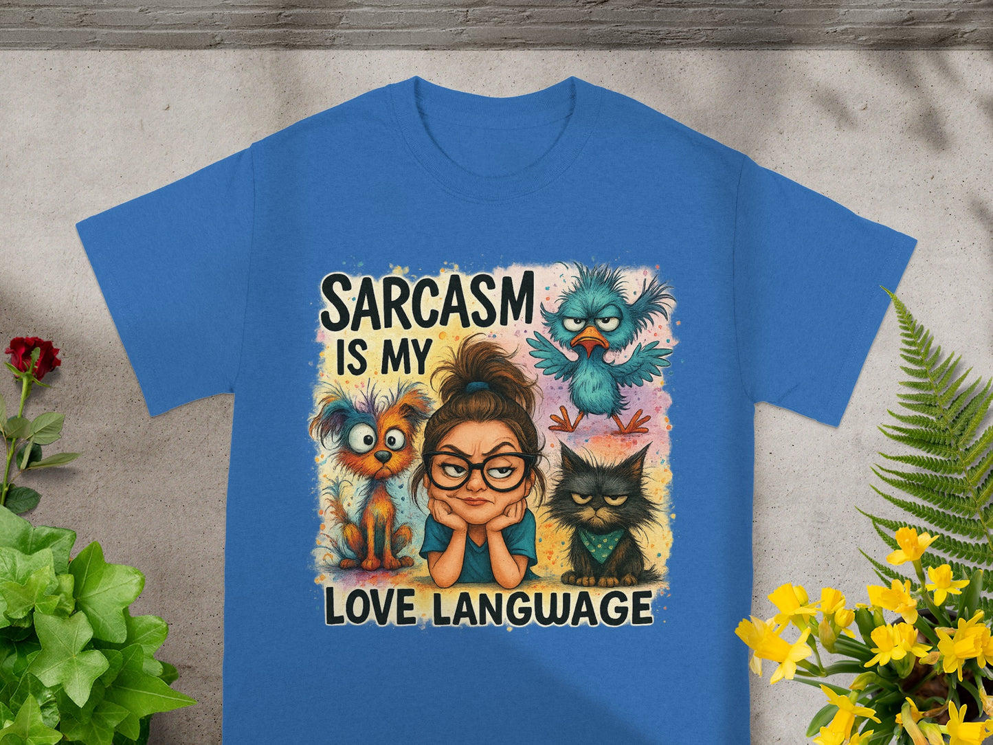 Blue t-shirt with cartoon animals and text "Sarcasm is my love language".