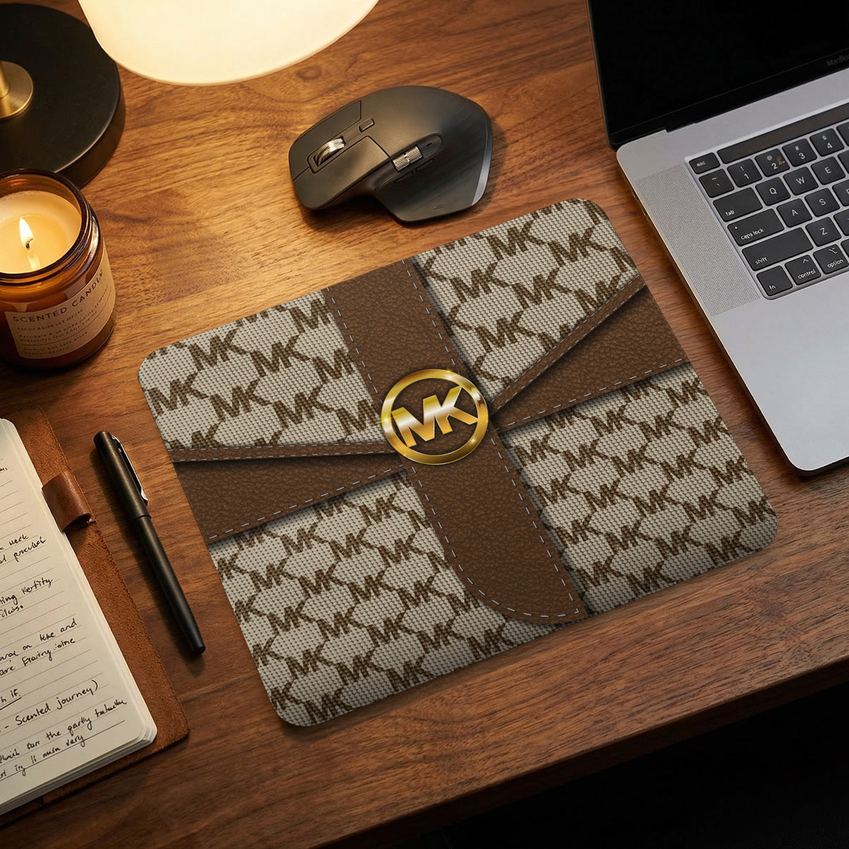 Mousepad with repeating MK pattern and a gold MK logo in the center.