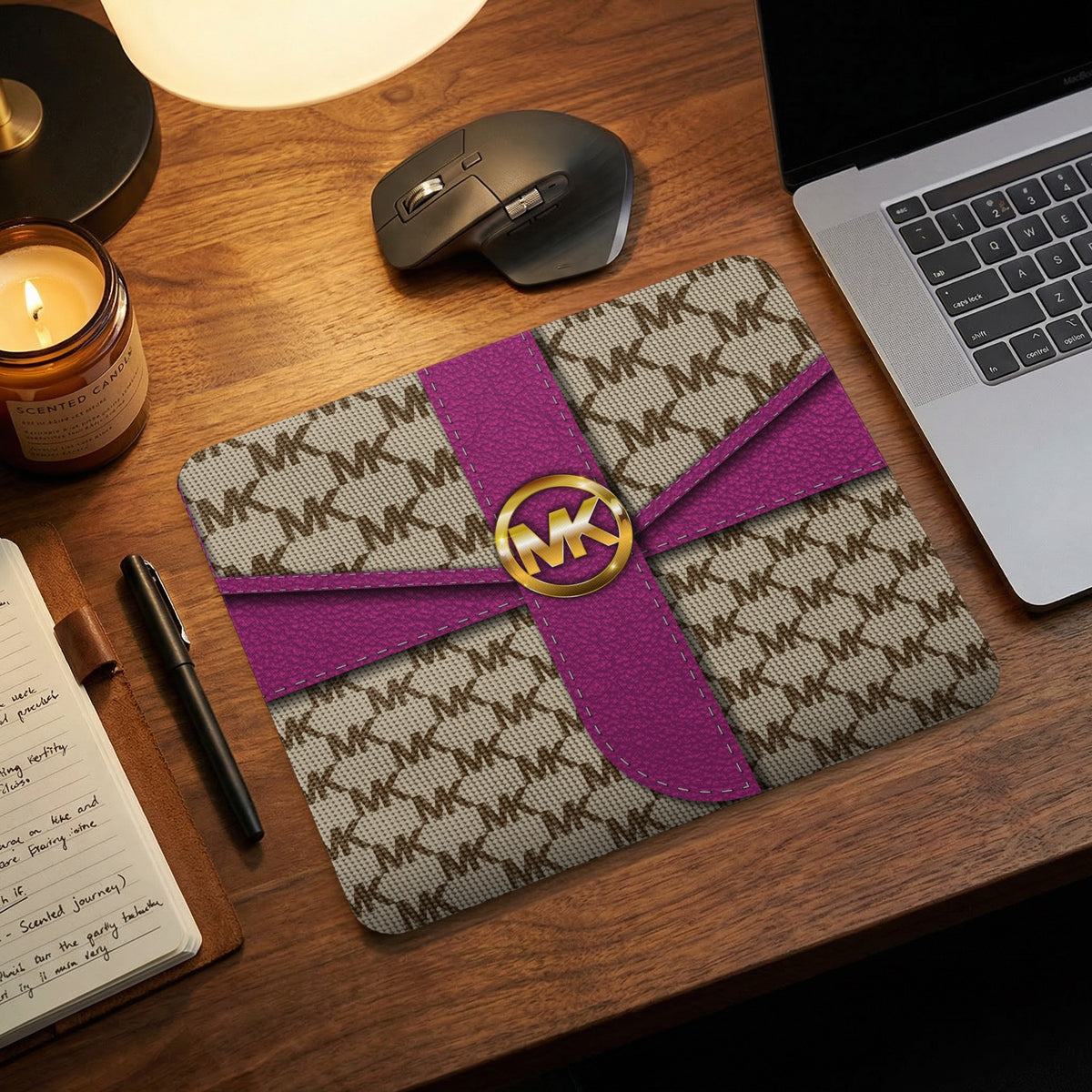 MK logo print mousepad with purple ribbon detail, gold MK emblem.
