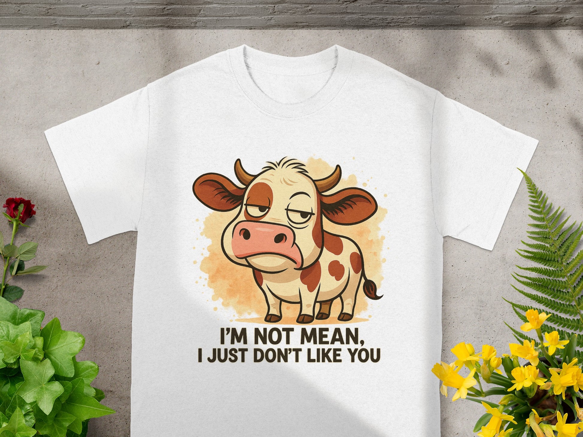 White t-shirt with cartoon cow and text "I'm not mean, I just don't like you".