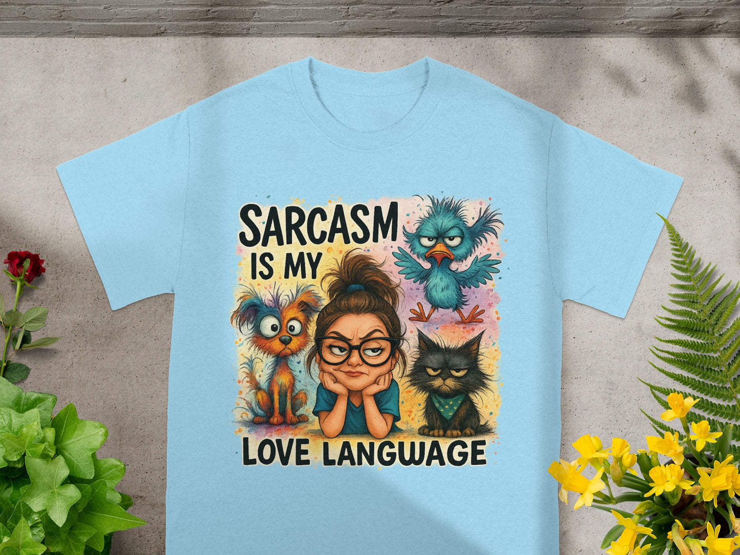 Light blue t-shirt with cartoon girl and animals, "SARCASM IS MY LOVE LANGUAGE" text.