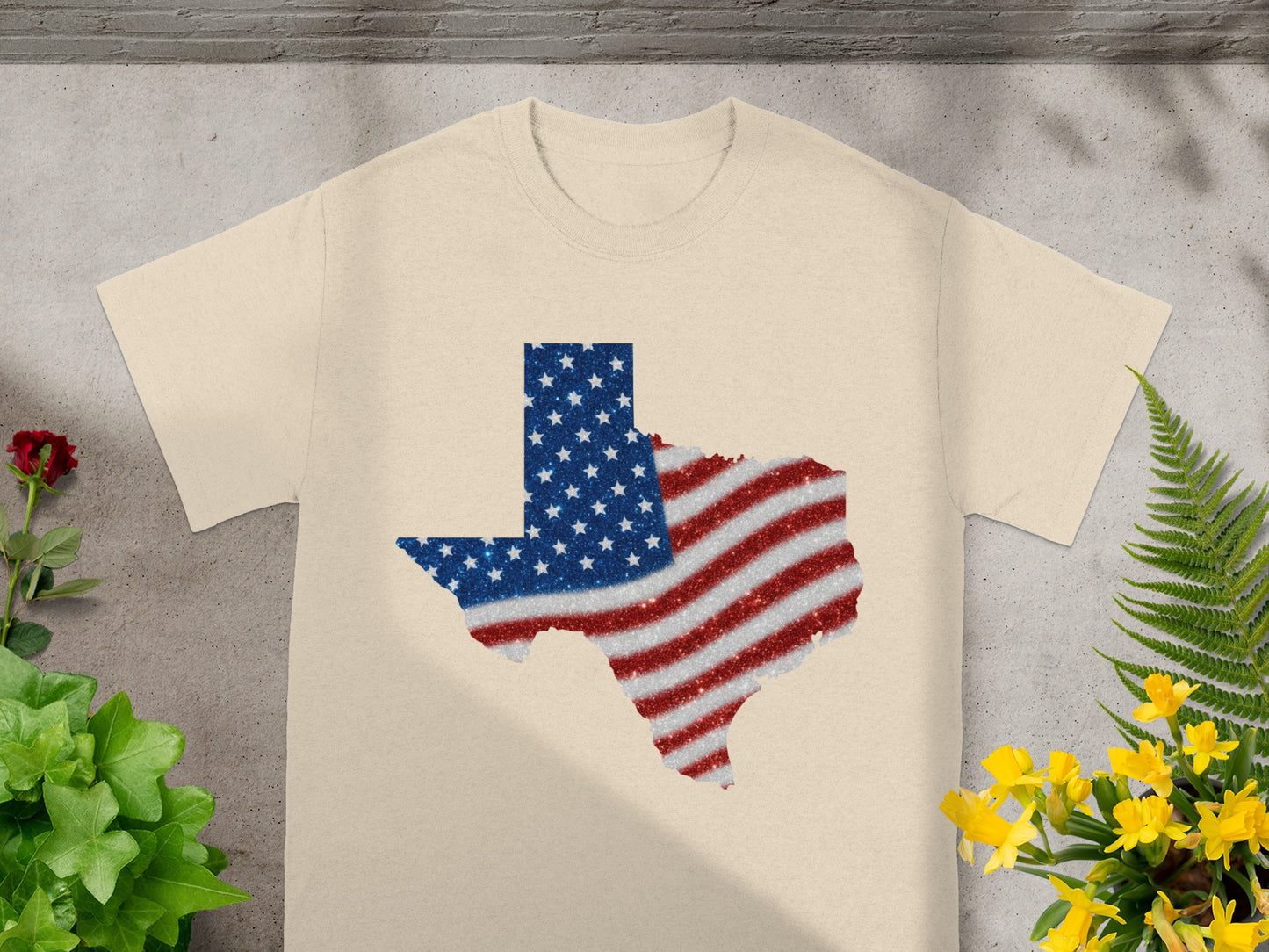 T-shirt with Texas outline in US flag glitter pattern.