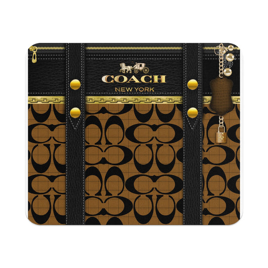 Coach logo pattern with horse and carriage, gold hardware, and hanging charm.