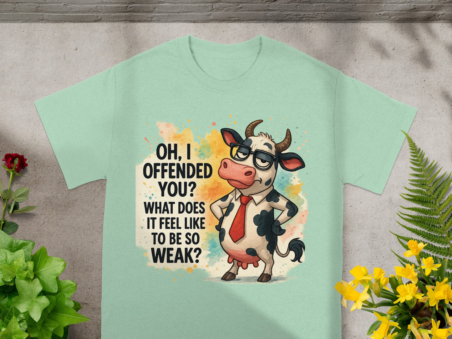 Mint t-shirt with a cow wearing glasses and tie saying "OH, I OFFENDED YOU?".