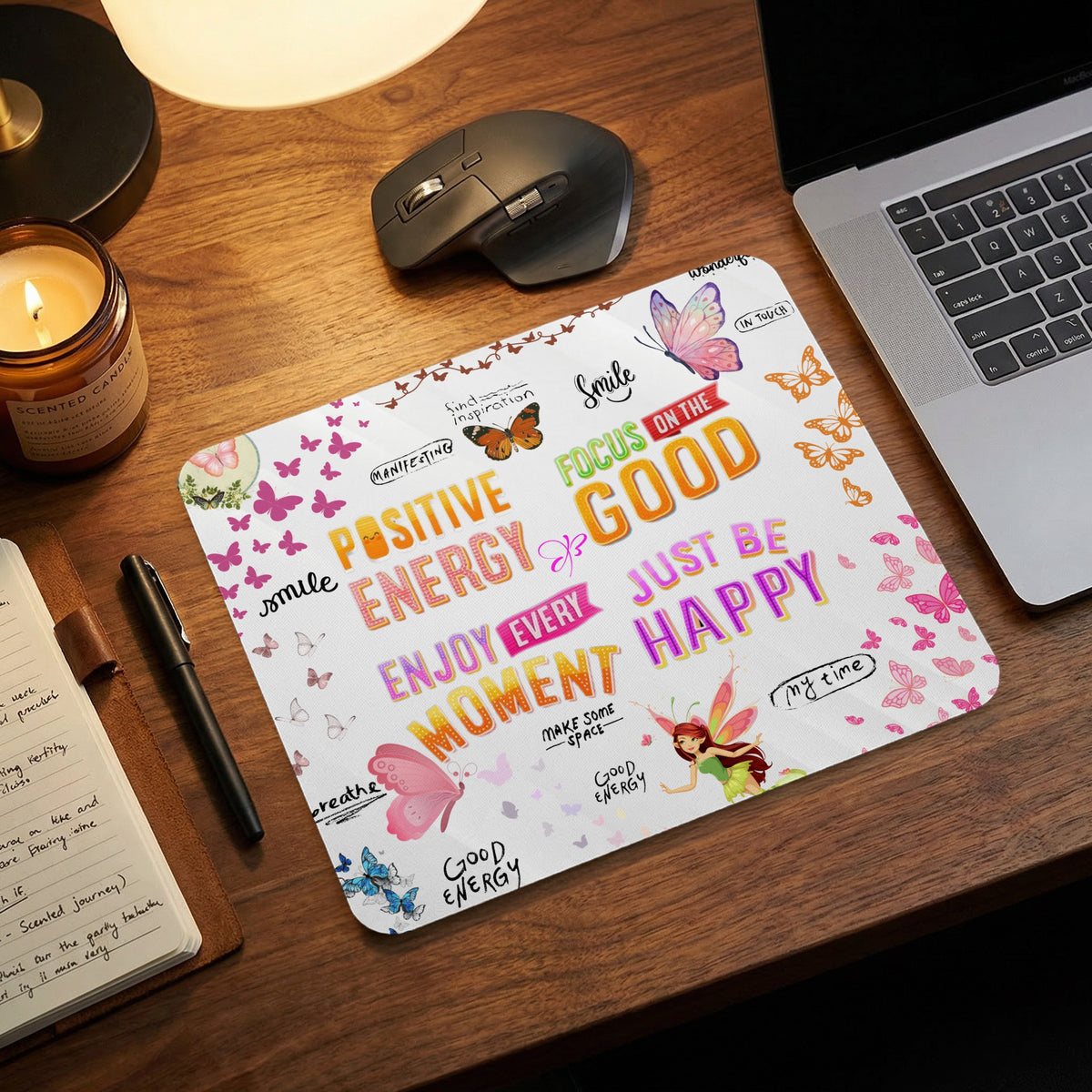 Mousepad with positive affirmations, butterflies, and fairies.