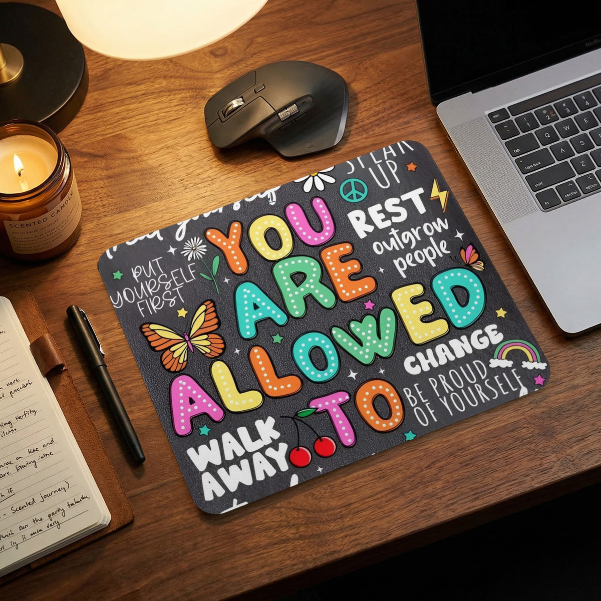 Mousepad with colorful text saying "YOU ARE ALLOWED TO WALK AWAY" and "BE PROUD OF YOURSELF".