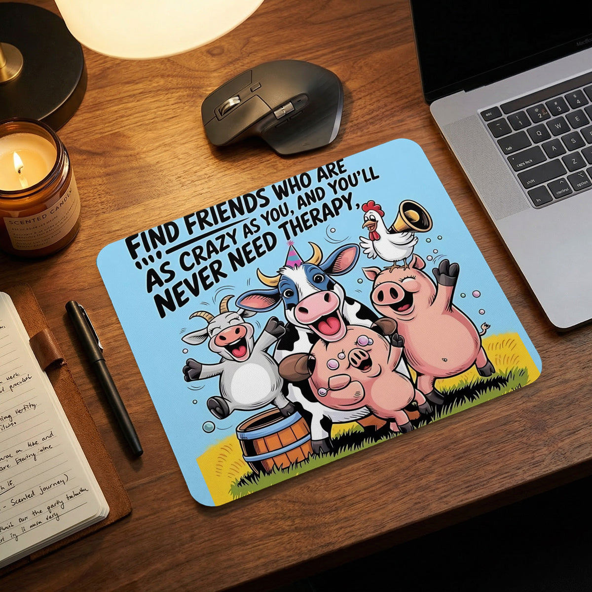 Mousepad with a funny cartoon farm animal illustration and text on a wooden desk.