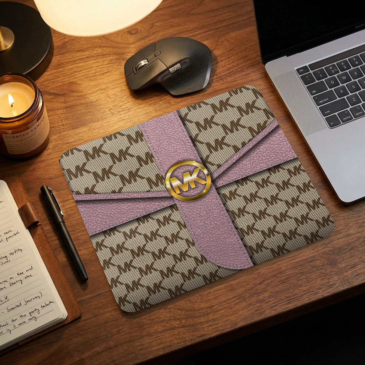 Michael Kors monogram mousepad with pink ribbon and gold logo.