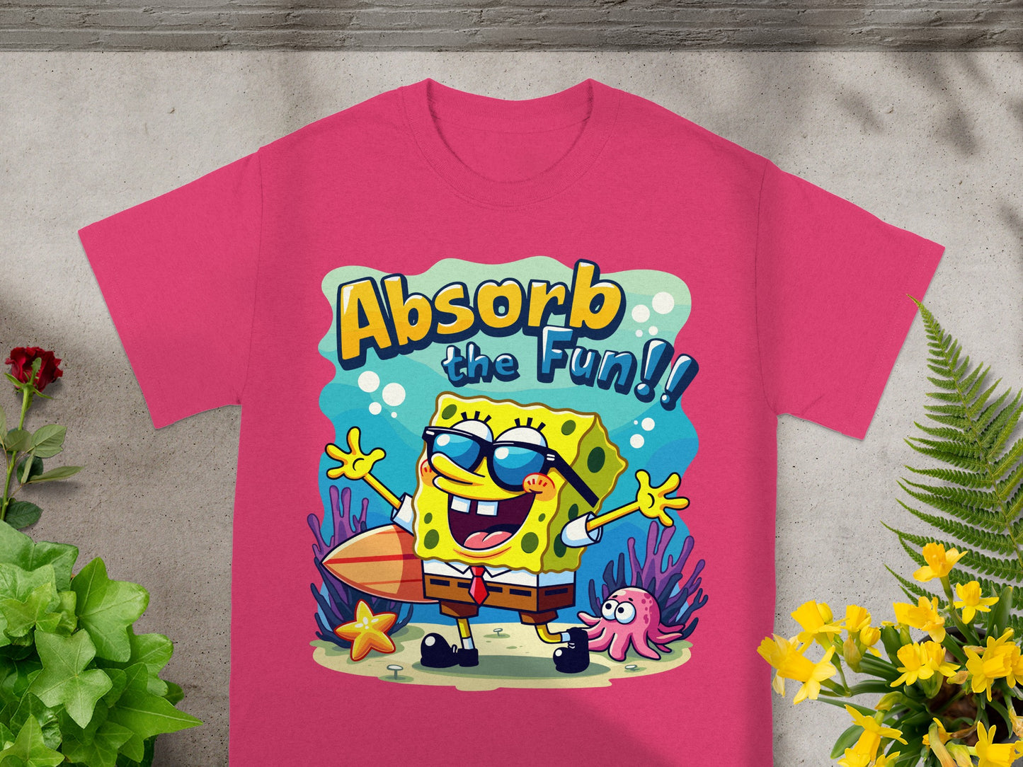 SpongeBob SquarePants t-shirt with "Absorb the Fun!" text and cartoon underwater scene.