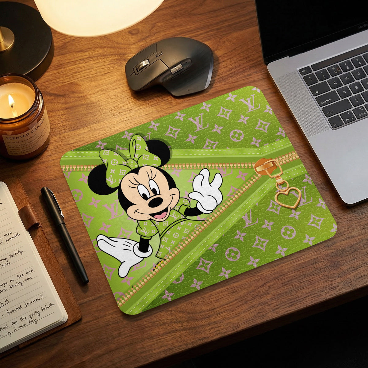 Minnie Mouse on a green mousepad with Louis Vuitton-inspired pattern and heart zipper charm.