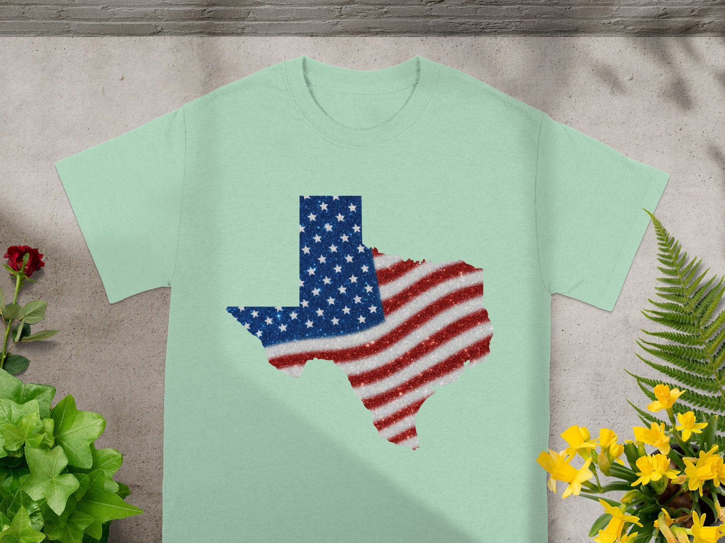 Light mint t-shirt with Texas outline filled with glitter American flag design.