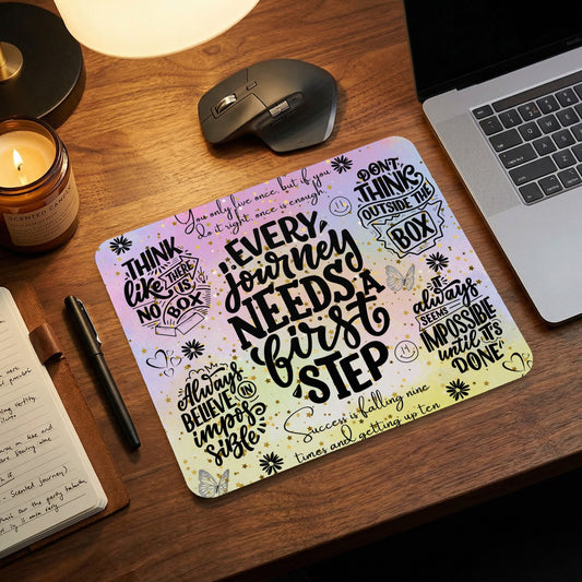 Mousepad with inspirational quotes and pastel gradient background.