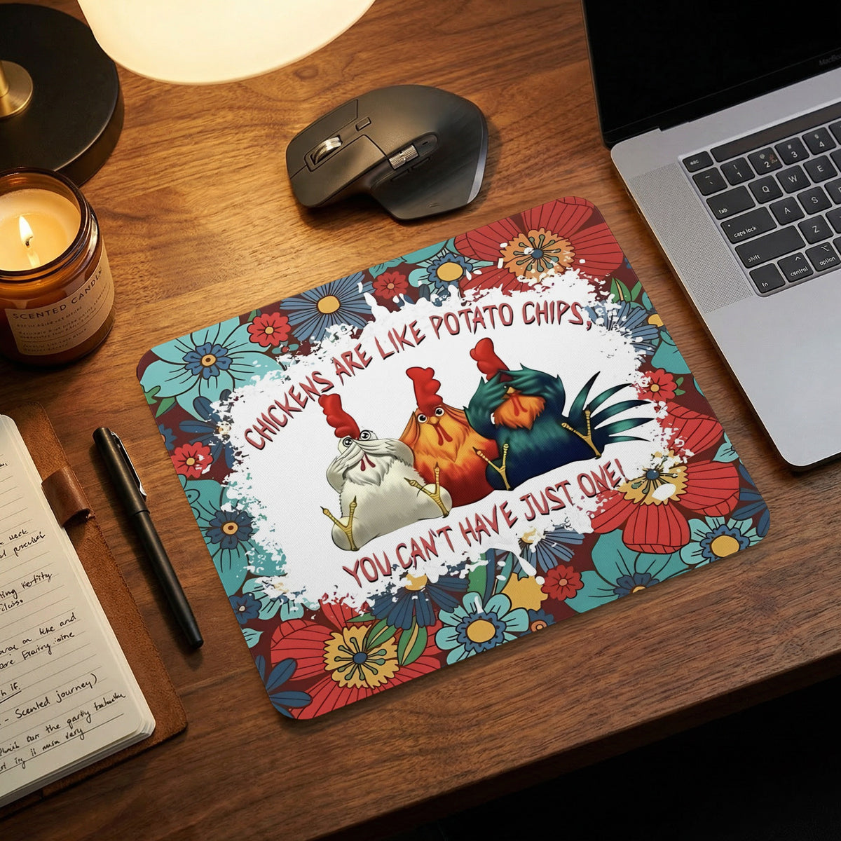Colorful floral mousepad featuring three cartoon chickens and text reading chickens are like potato chips, you cant have just one.