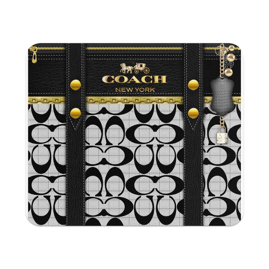 Coach New York logo with C-pattern background, gold zipper, and charms.