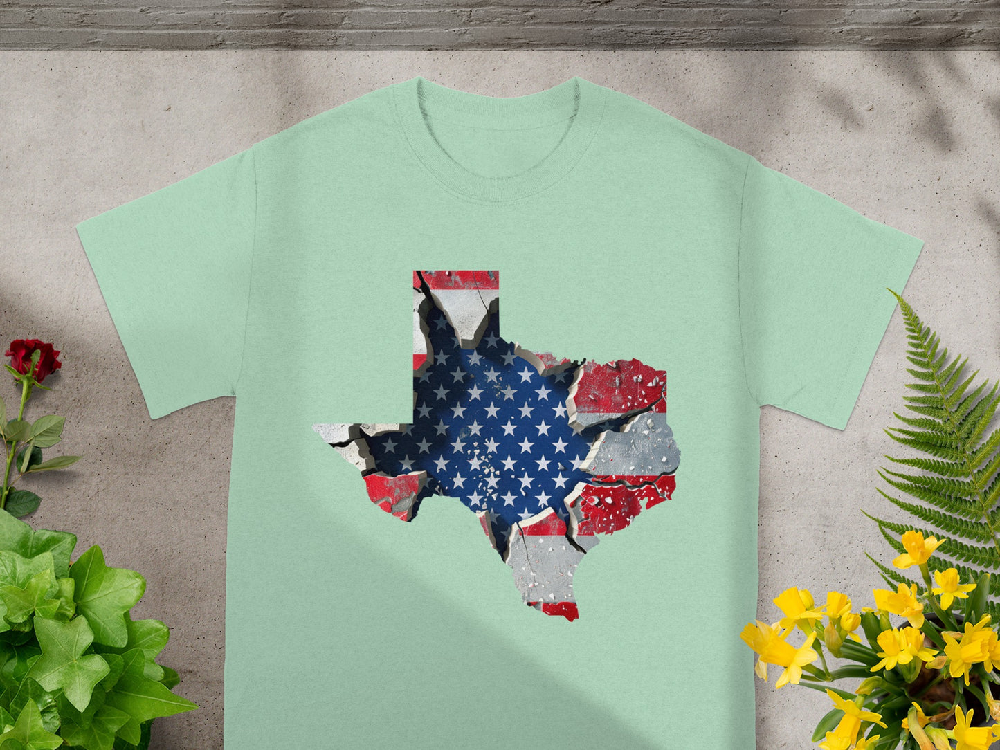 Light green t-shirt with a distressed Texas map filled with US flag pattern.