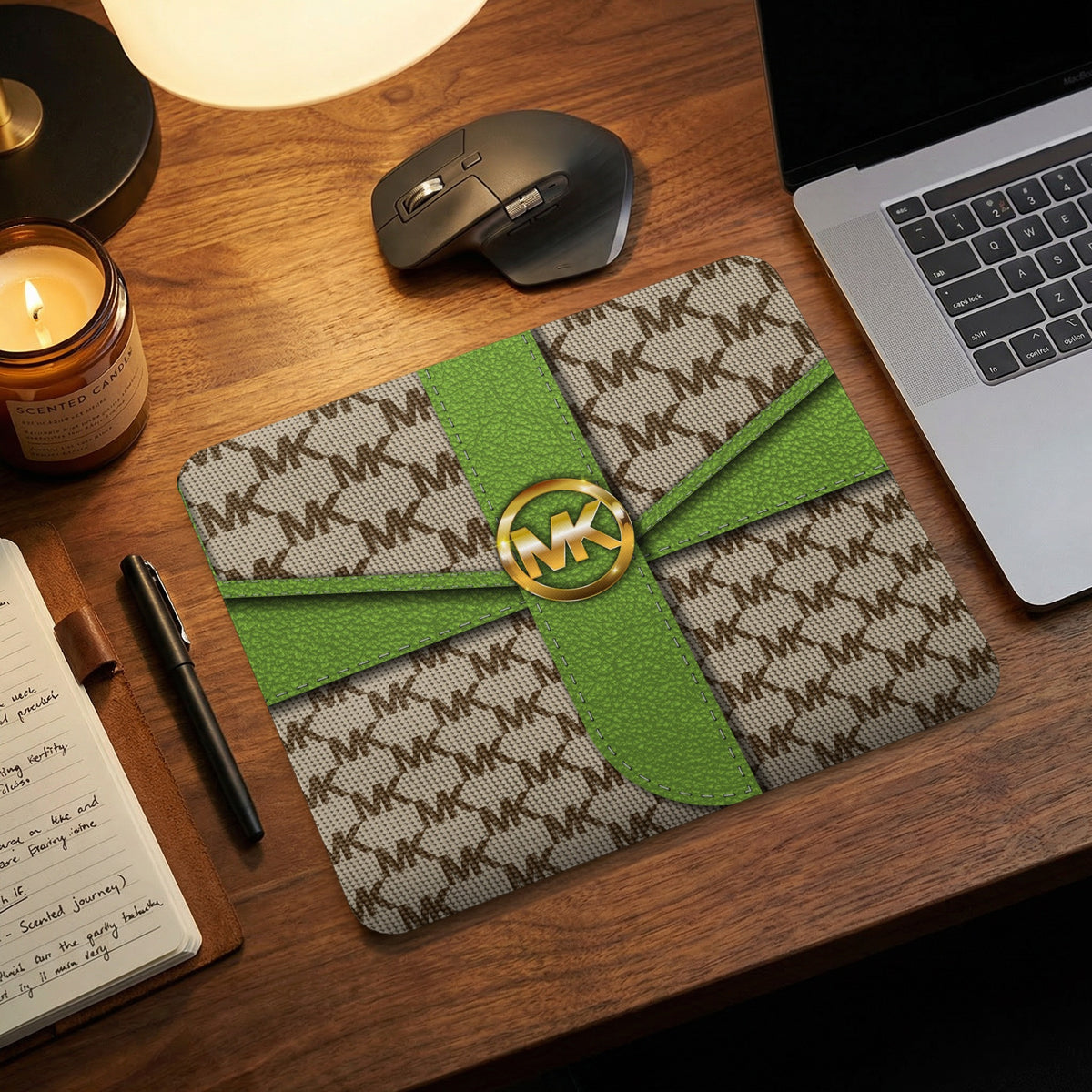 Michael Kors MK monogram mousepad with green ribbon and gold logo.