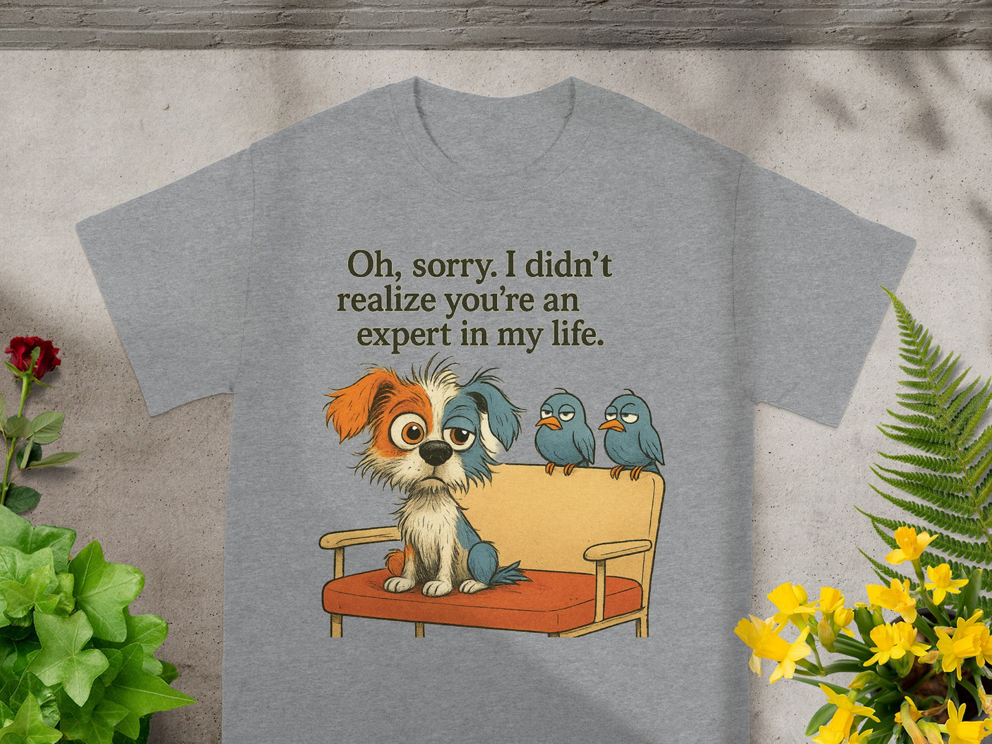Gray t-shirt with a dog and three birds on a couch, text says "Oh, sorry. I didn't realize you're an expert in my life."