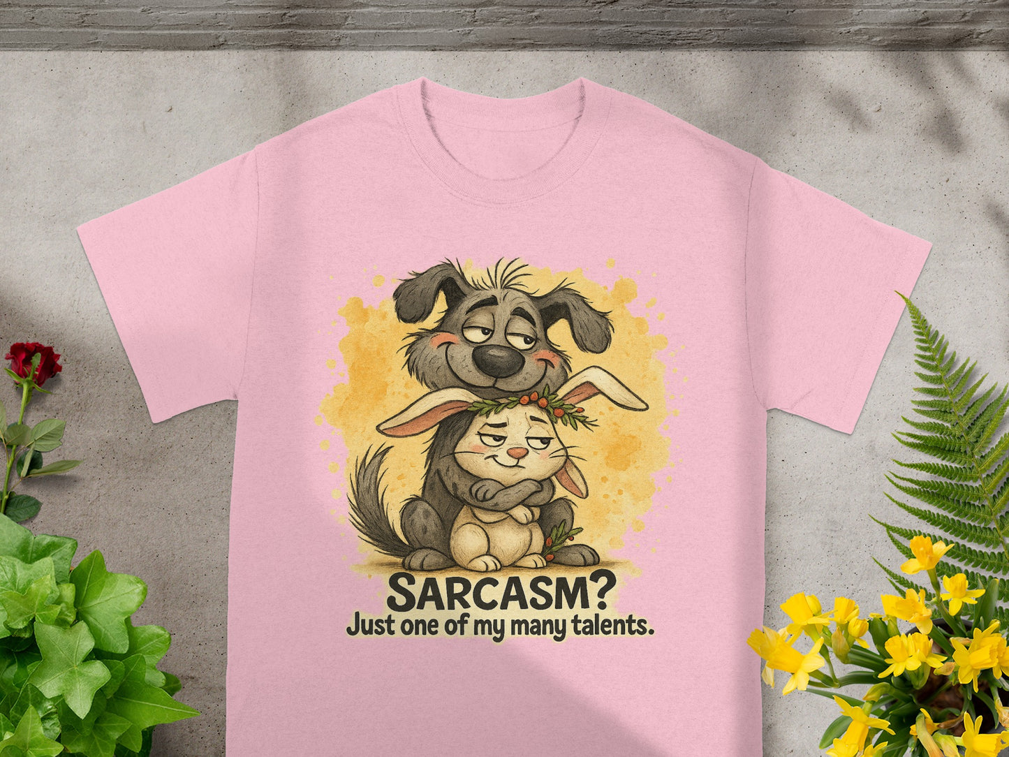 Pink t-shirt with cartoon dog hugging a rabbit and text "Sarcasm? Just one of my many talents."
