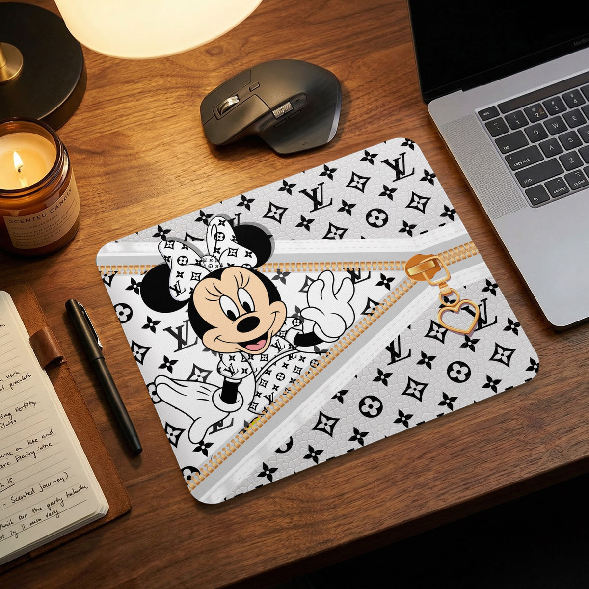 Minnie Mouse with heart charm on a mousepad with a designer pattern.