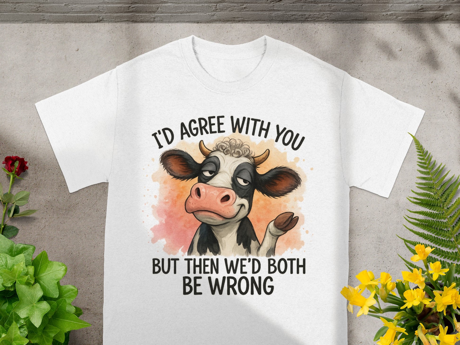 White t-shirt with cartoon cow and text "I'd agree with you but then we'd both be wrong."
