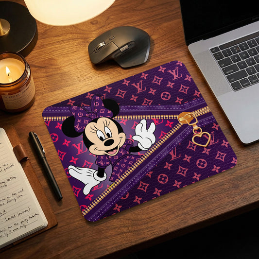 Minnie Mouse on purple mousepad with monogram and gold zipper detail.