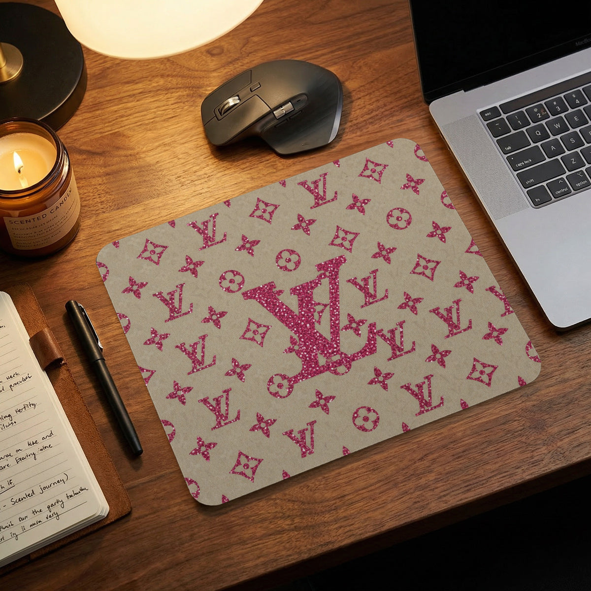 Mousepad with pink glitter LV monogram pattern on beige background.