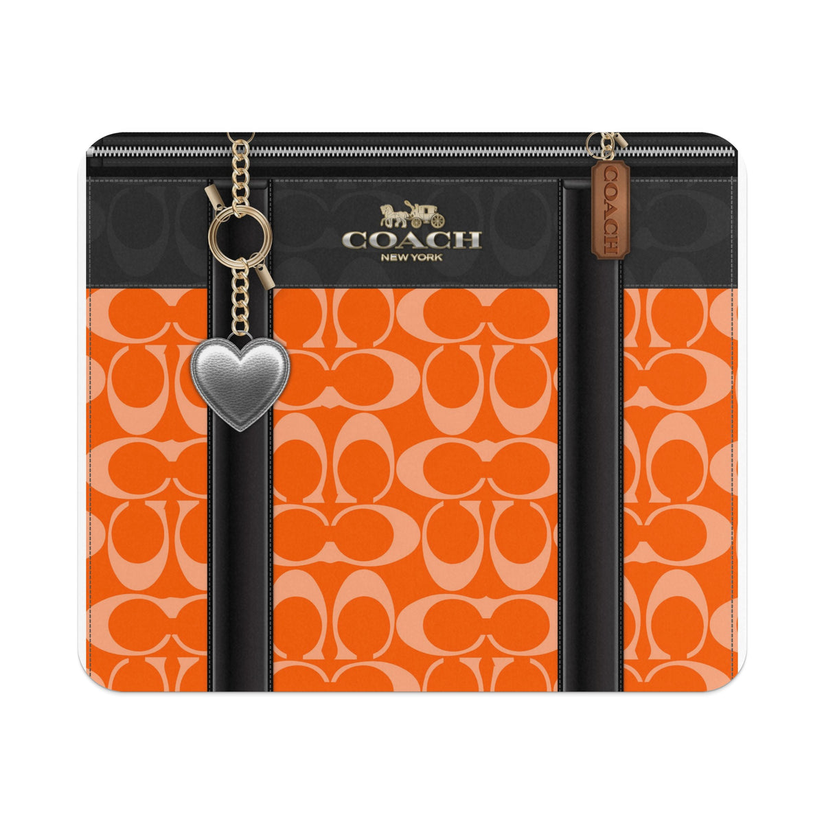 Coach orange C-print tote with silver heart charm and tan tag.