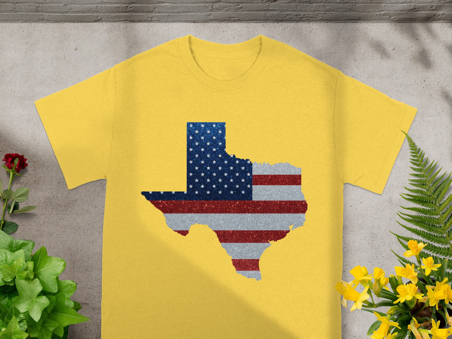 Yellow t-shirt with a glittery Texas outline filled with the American flag.