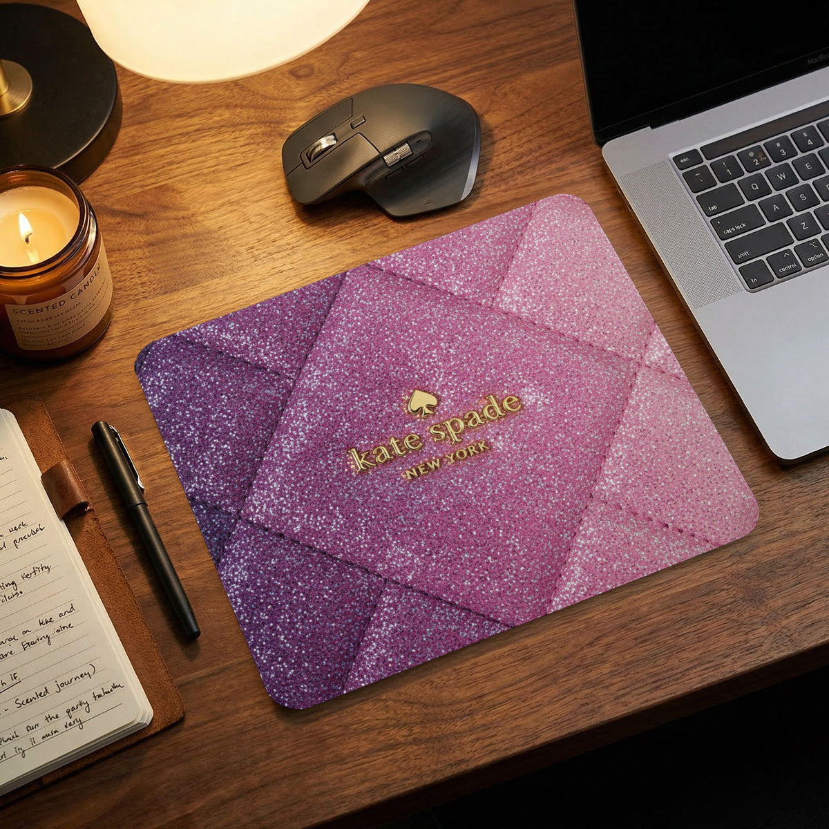 Kate Spade New York glitter mousepad with quilted pattern in pink and purple.