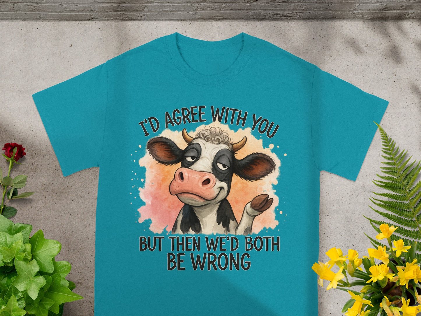 Teal t-shirt with a cartoon cow and text, "I'd agree with you, but then we'd both be wrong."