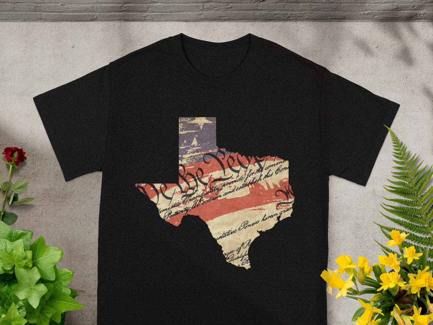 Black t-shirt with Texas shape overlayed with US Constitution text and flag.