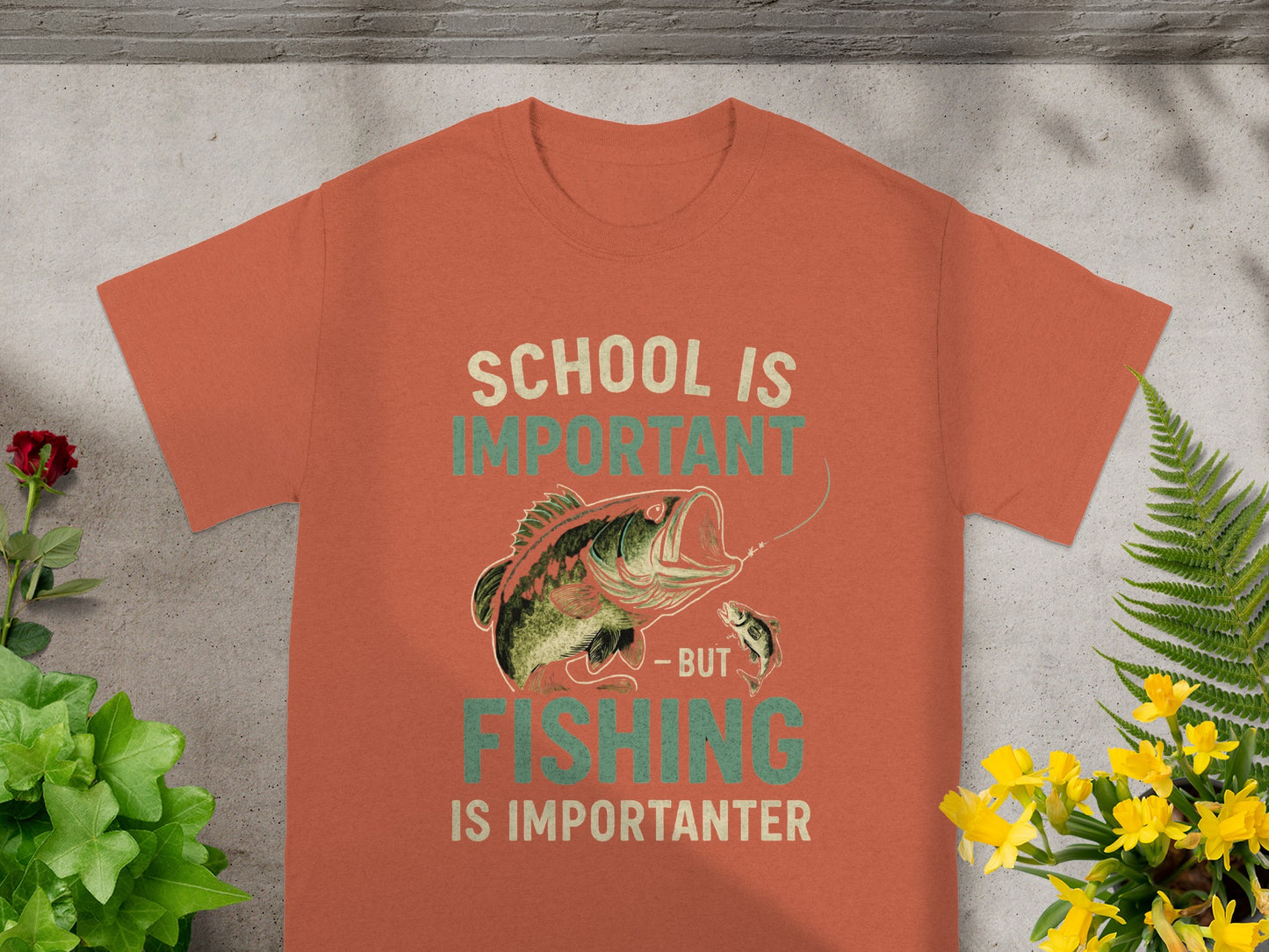 Orange t-shirt with "School is Important - But Fishing is Importanter" text and fish graphic.