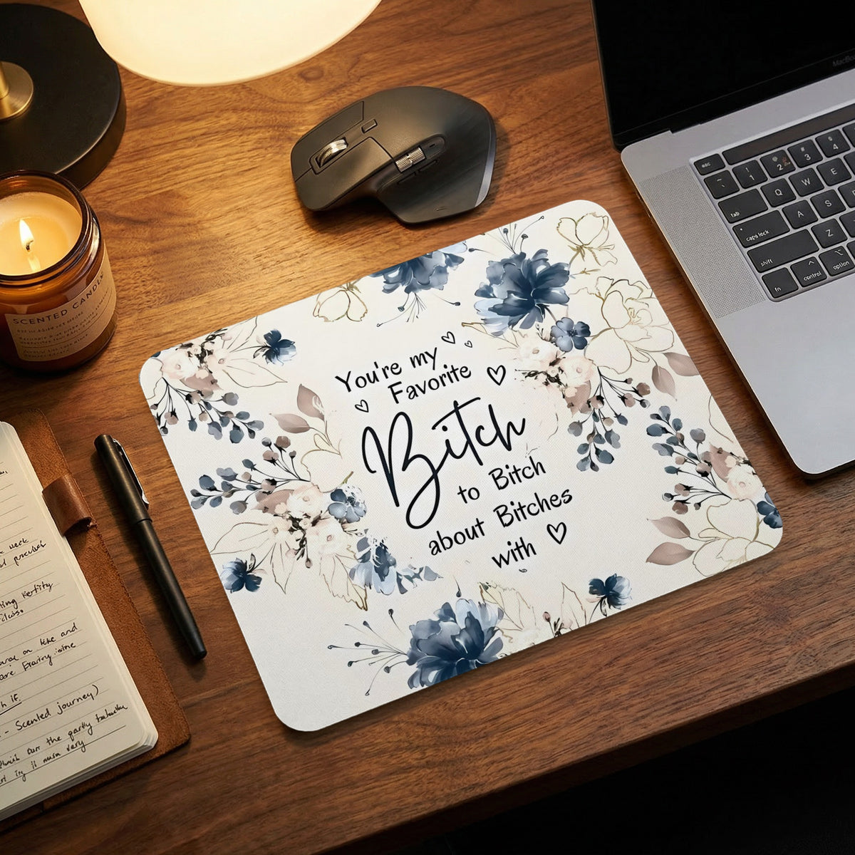 A rectangular mouse pad with blue floral patterns and the text You are my favorite Bitch to Bitch about Bitches with hearts.