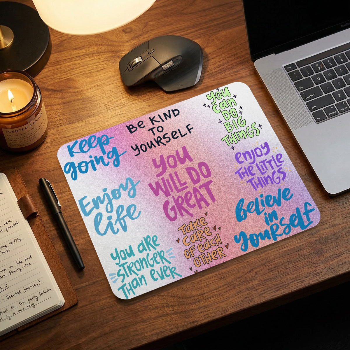 Mousepad with inspirational quotes and colorful typography, including "Be Kind to Yourself" and "Believe in Yourself."